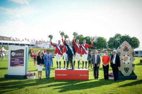 At the prize-giving for today’s Furusiyya FEI Nations Cup™ Jumping 2015 Europe Division 1 qualifier at St Gallen, Switzerland where Team Belgium were victorious: (L to R) Sabrina Zeender, FEI Secretary General; Farouk Mohamad Wazeer Ali, Saudi Arabian Chargé d’affaires to Switzerland; winning Belgian team Niels Bruynseels, Pieter Devos, Dirk Demeersmann (Chef d’Equipe), Greogry Wathelet, Jos Verlooy; Markus Straub, Präsident des Kantonsrates des Kantons St. Gallen; Nayla Stössel, President of Organising Com