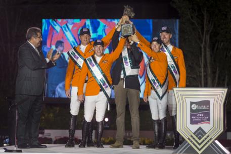The Furusiyya FEI Nations Cup™ Jumping 2014 champions from The Netherlands celebrate their victory in the Final at the Real Club de Polo in Barcelona (ESP) last October: (L to R) HH Prince Faisal of Saudi Arabia with Dutch team members Jeroen Dubbeldam, Gerco Schröder, Chef d’Equipe Rob Ehrens, Maikel van der Vleuten and Jur Vrieling. (FEI/Dirk Caremans)