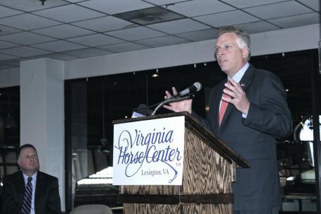 Virginia Governor Terry McAuliffe addresses the group at the Virginia Horse Center.