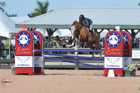 Todd Minikus clears the Equine Couture/TuffRider fence during the first week of the 2015 Winter Equestrian Festival. Equine Couture and TuffRider are proud to be a part of this year's circuit. Photo by Sportfot.