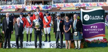 Team USA won their third consecutive Furusiyya FEI Nations Cup™ Jumping competition at the last leg of the Europe Division 1 2014 series in Dublin, Ireland today.  Pictured (L to R): Matt Dempsey, President of the Royal Dublin Society: His Excellency the President Of Ireland Micheal D Higgins: Katie Dinan, Jessica Springsteen, Charlie Jayne, Chef d'Equipe Robert Ridland and Beezie Madden from Team USA; Saudi Arabian Ambassador to Ireland His Excellency Abdul Aziz Abdul Rahman Aldriss: Katrina Jones, Brand D