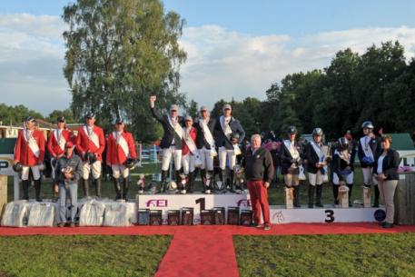On the winner’s podium at the FEI European Jumping Championships for Veterans 2014 at Hoogboom-Kapellen in Belgium - (L to R) Team Germany (silver), Team Belgium (gold) and Team Great Britain (bronze). (www.fotoagentur-Dill.de/FEI)