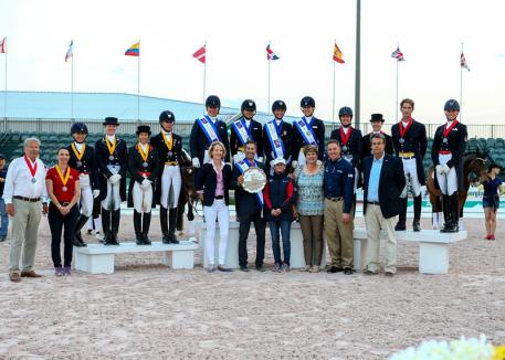 On the podium for the second leg of the FEI Nations Cup™ Dressage 2015 series in Wellington, USA (from left) - 3rd-placed Team Canada 2,  winners Team USA 1, 2nd-placed Team Canada 1. (FEI/Susan Stickle)